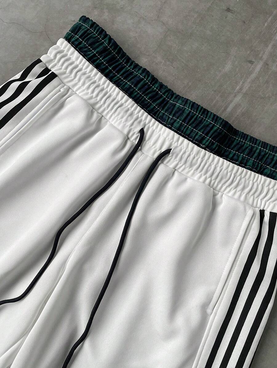 Pantalon de survêtement à rayures et jambes larges avec ceinture double épaisseur