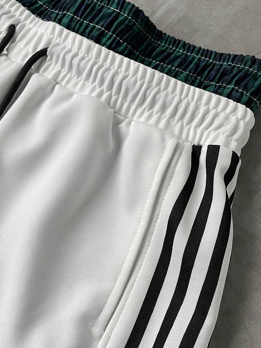 Pantalon de survêtement à rayures et jambes larges avec ceinture double épaisseur