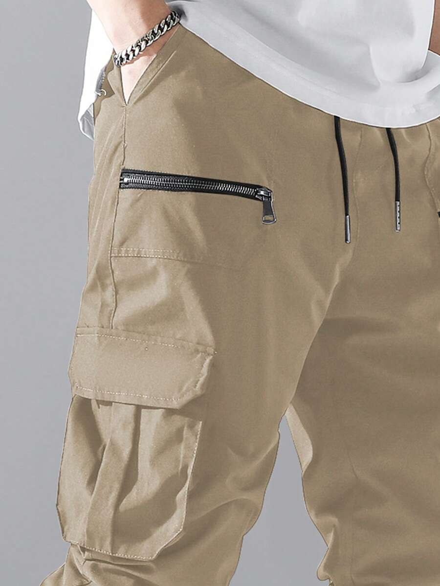 Pantalon cargo ample avec poches à rabat et cordons de serrage pour homme