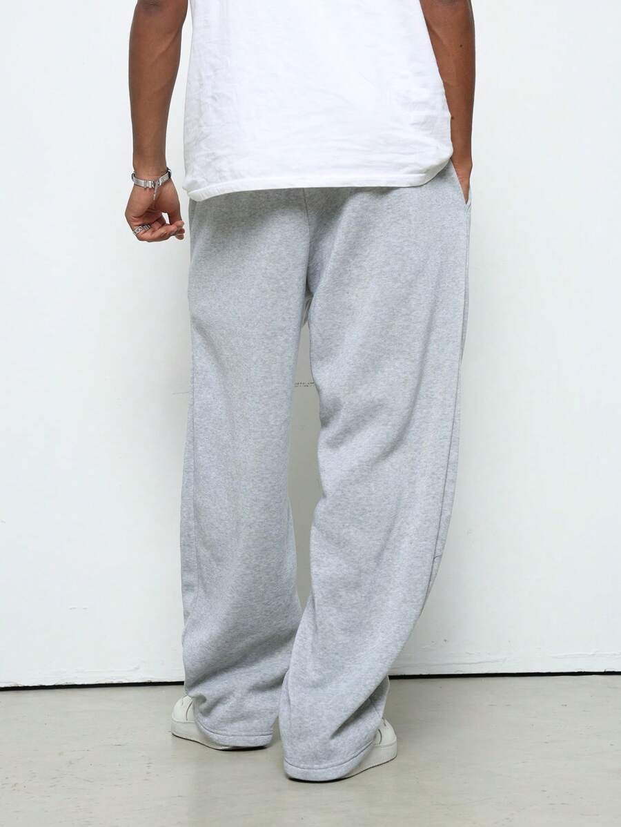 Pantalon droit athlétique ultra-ample à la mode avec cordon de serrage pour homme