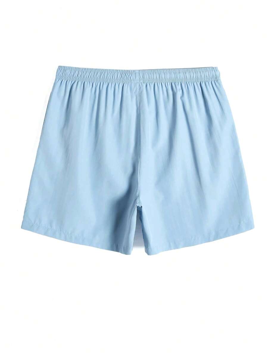 Short court décontracté de style plage avec cordon de serrage pour homme