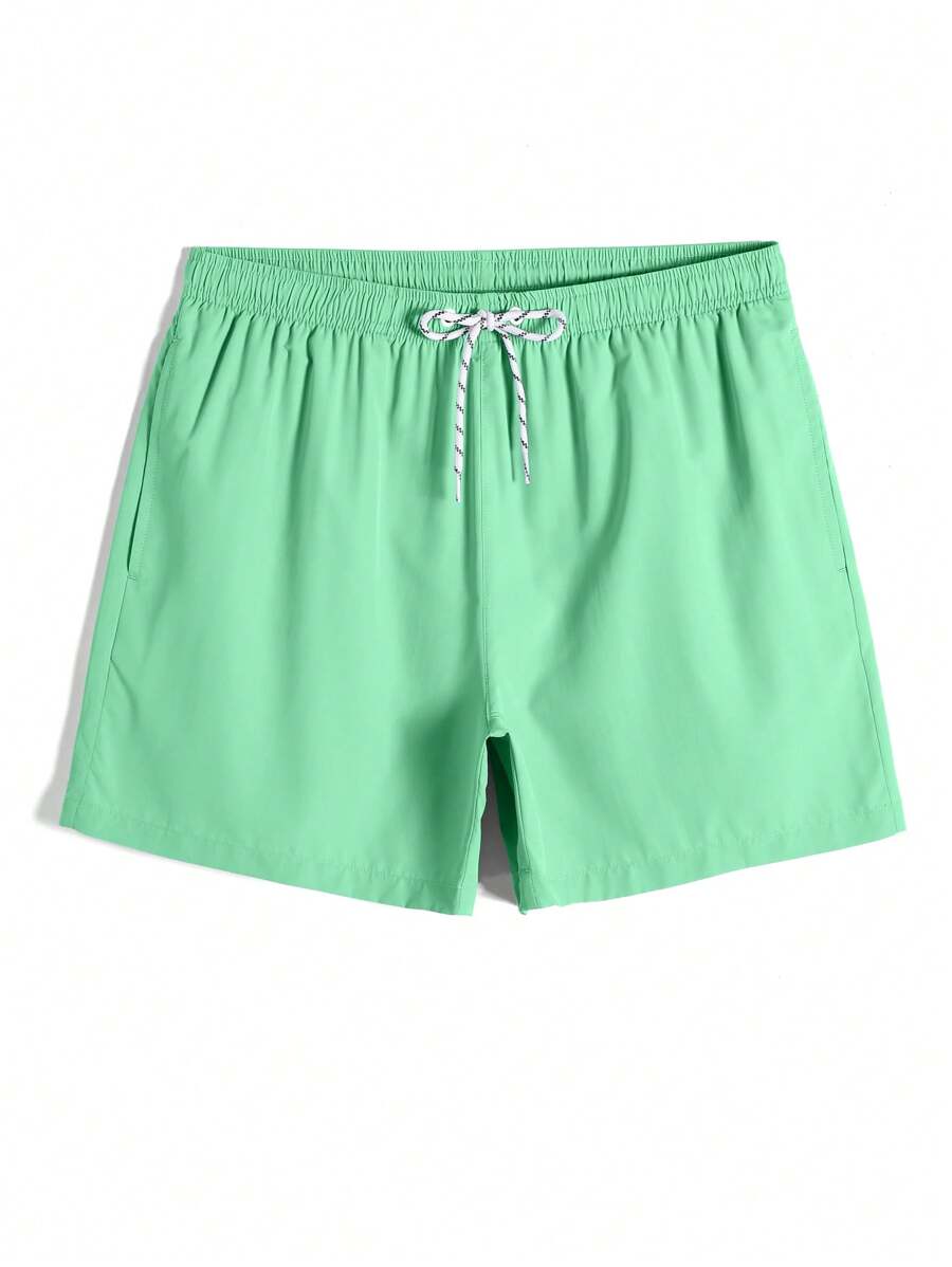 Short court décontracté de style plage avec cordon de serrage pour homme