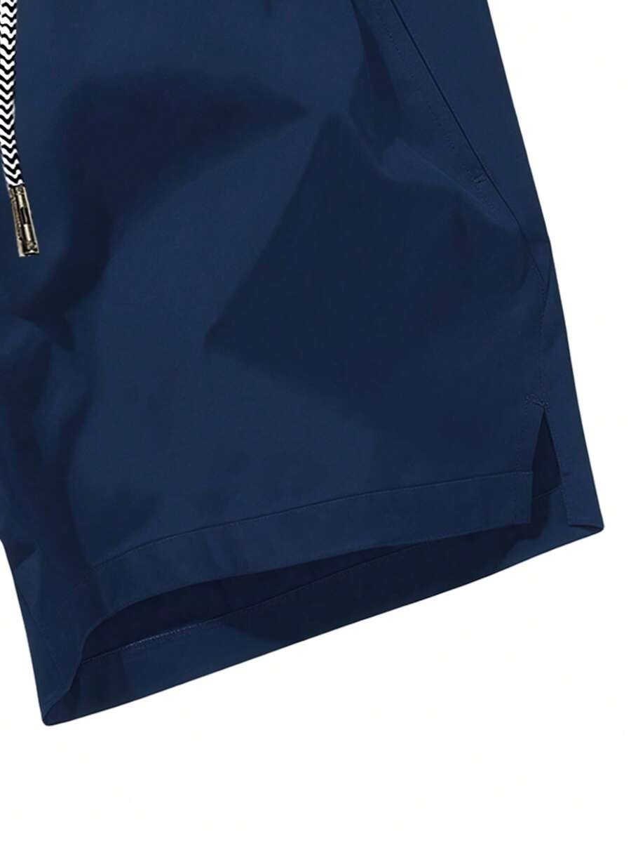 Shorts de sport taille élastique avec poches zippées et cordon