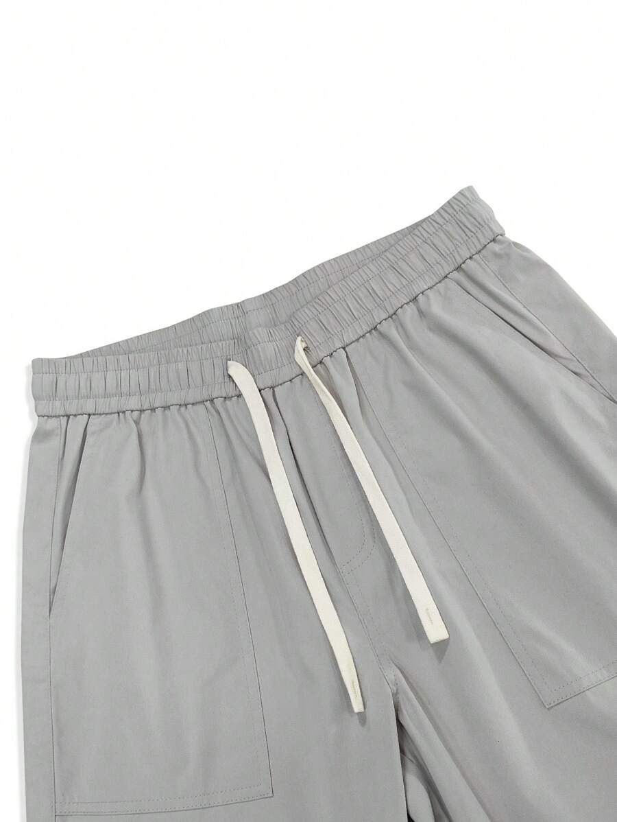 Pantalon cargo streetwear droit avec grandes poches style décontracté