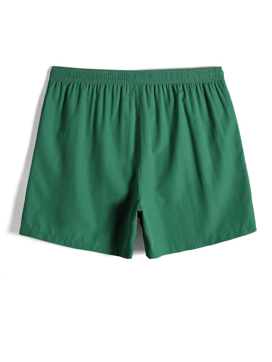 Short court décontracté de style plage avec cordon de serrage pour homme