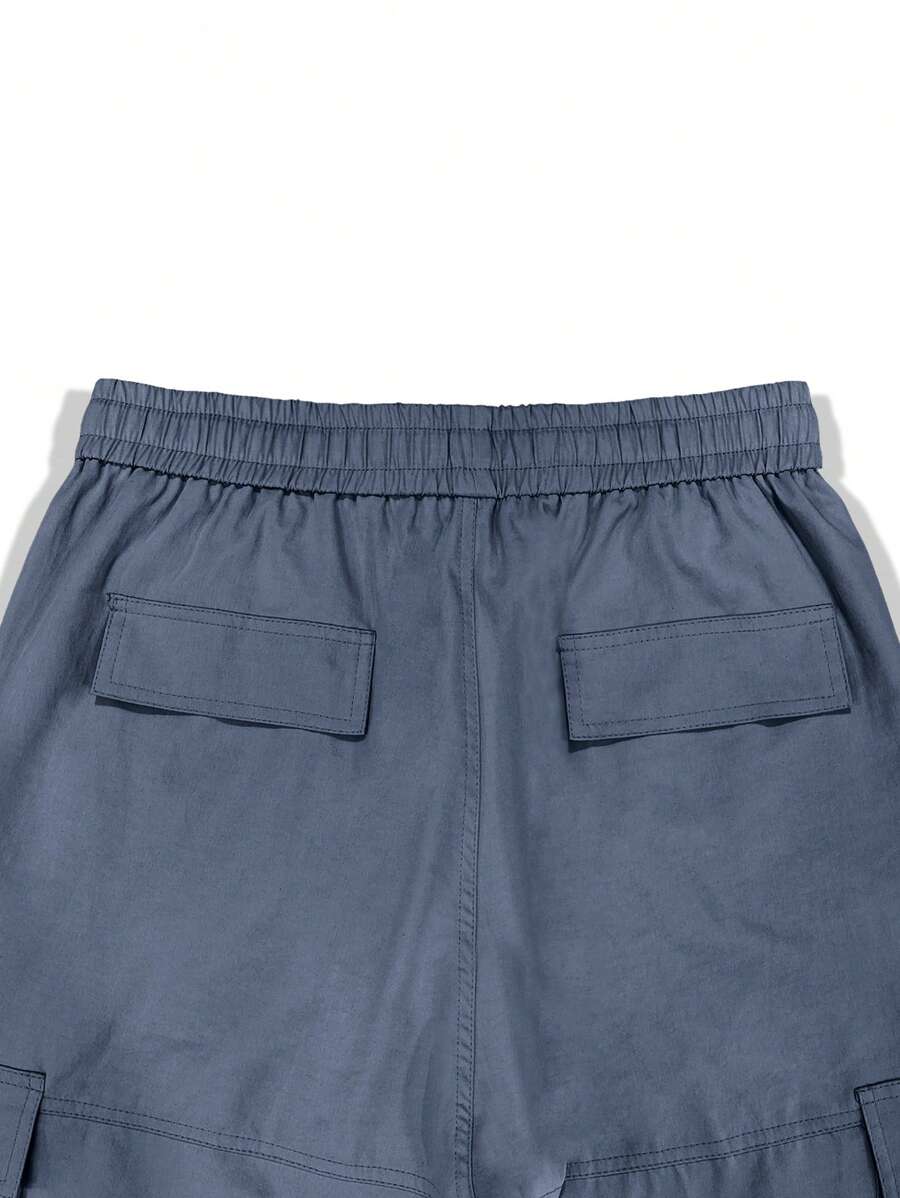 Pantalon cargo homme coupe ample avec poches rabat style décontracté