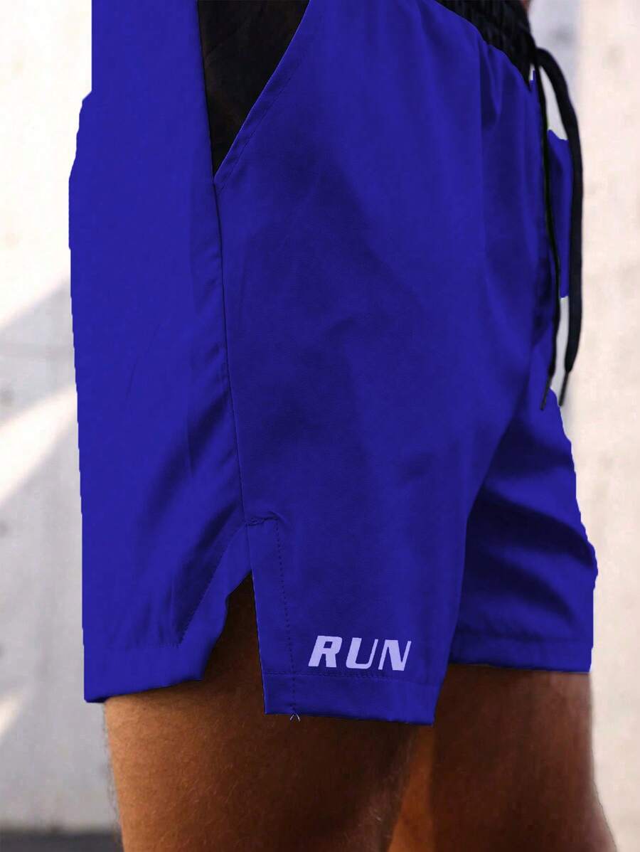 Shorts de sport avec taille élastique, poches larges et inscription