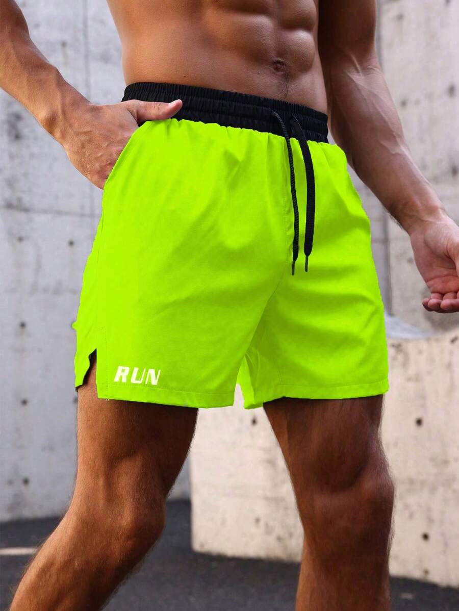 Shorts de sport avec taille élastique, poches larges et inscription