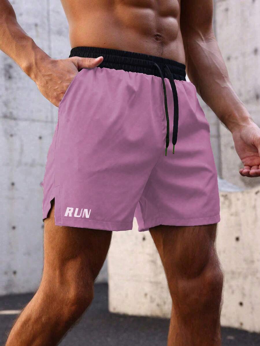 Shorts de sport avec taille élastique, poches larges et inscription
