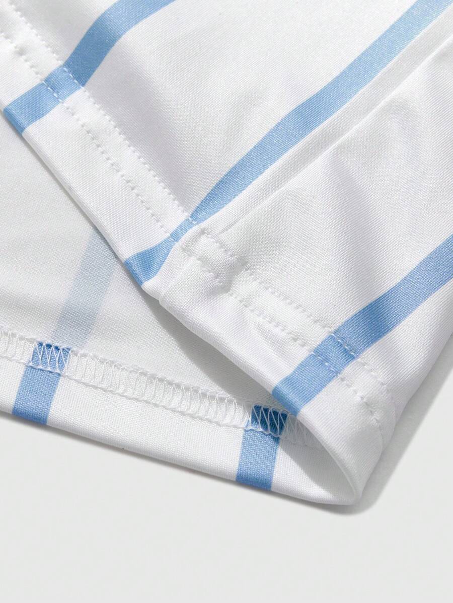 Chemise décontractée à manches courtes et rayures, col rond et coupe ample