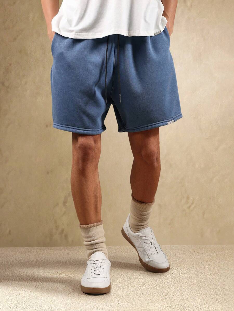 Bermuda athlétique taille haute à entrejambe bas – Style détente pour homme