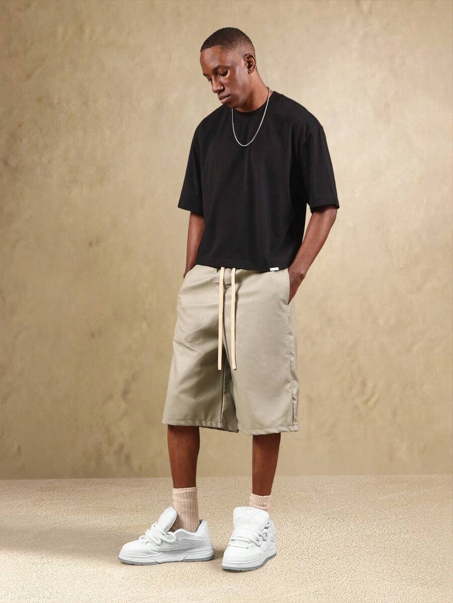 Bermuda large en similicuir avec cordon de serrage – Urban Athleisure pour homme