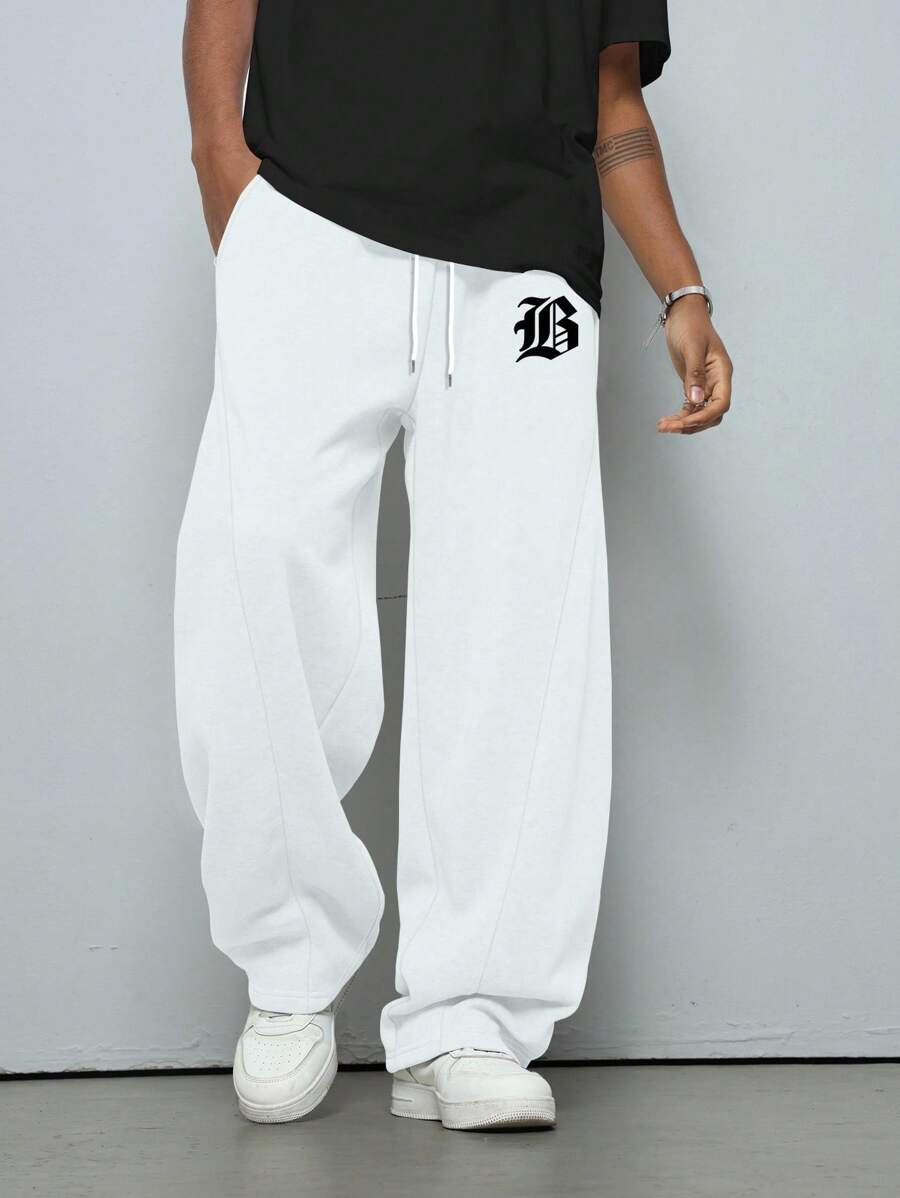 Pantalon droit athlétique ultra-ample à la mode avec cordon de serrage pour homme
