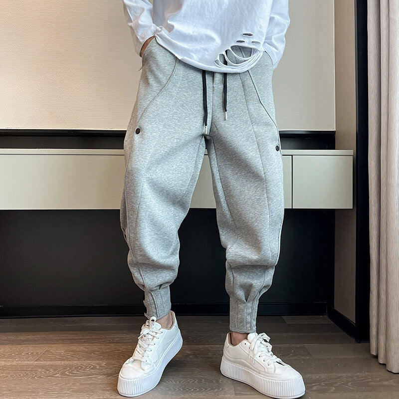 Pantalon de survêtement fuselé en velours de coton avec poche et boutons aux poignets