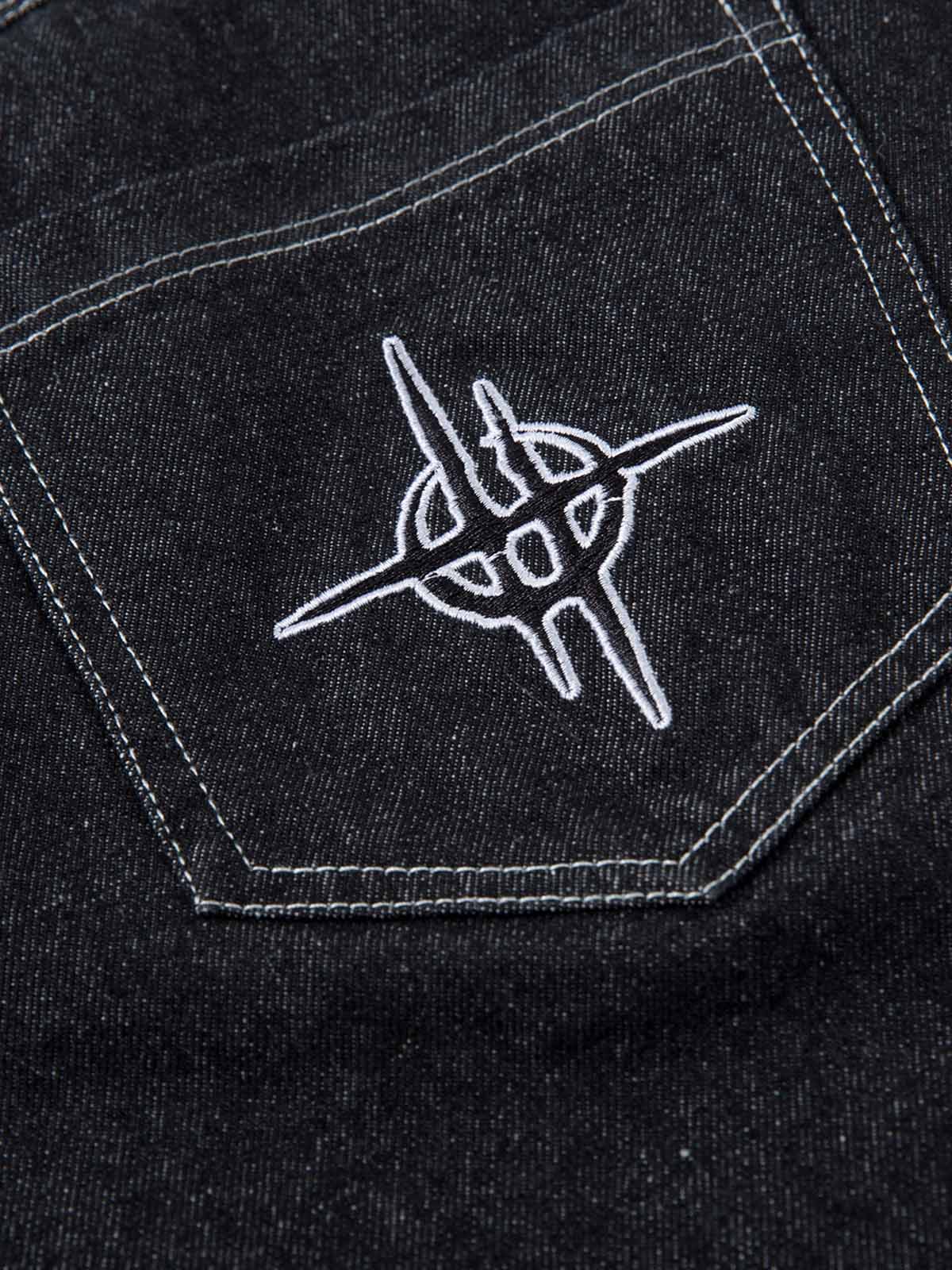 Pantalon ample à jambes larges et brodé de flammes pour homme