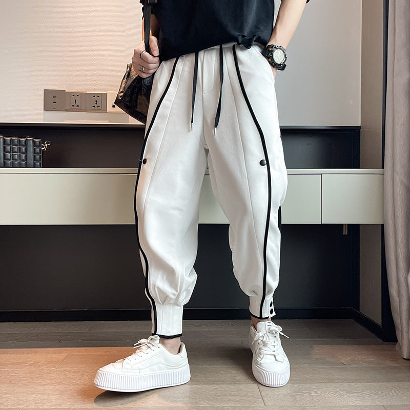 Pantalon de survêtement fuselé en velours de coton avec poche et boutons aux poignets