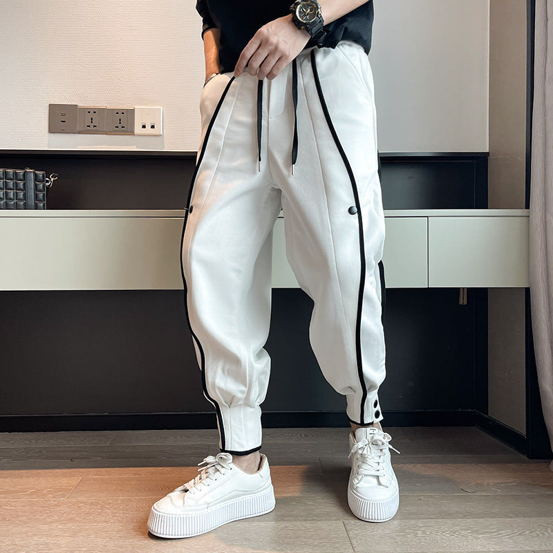 Pantalon de survêtement fuselé en velours de coton avec poche et boutons aux poignets