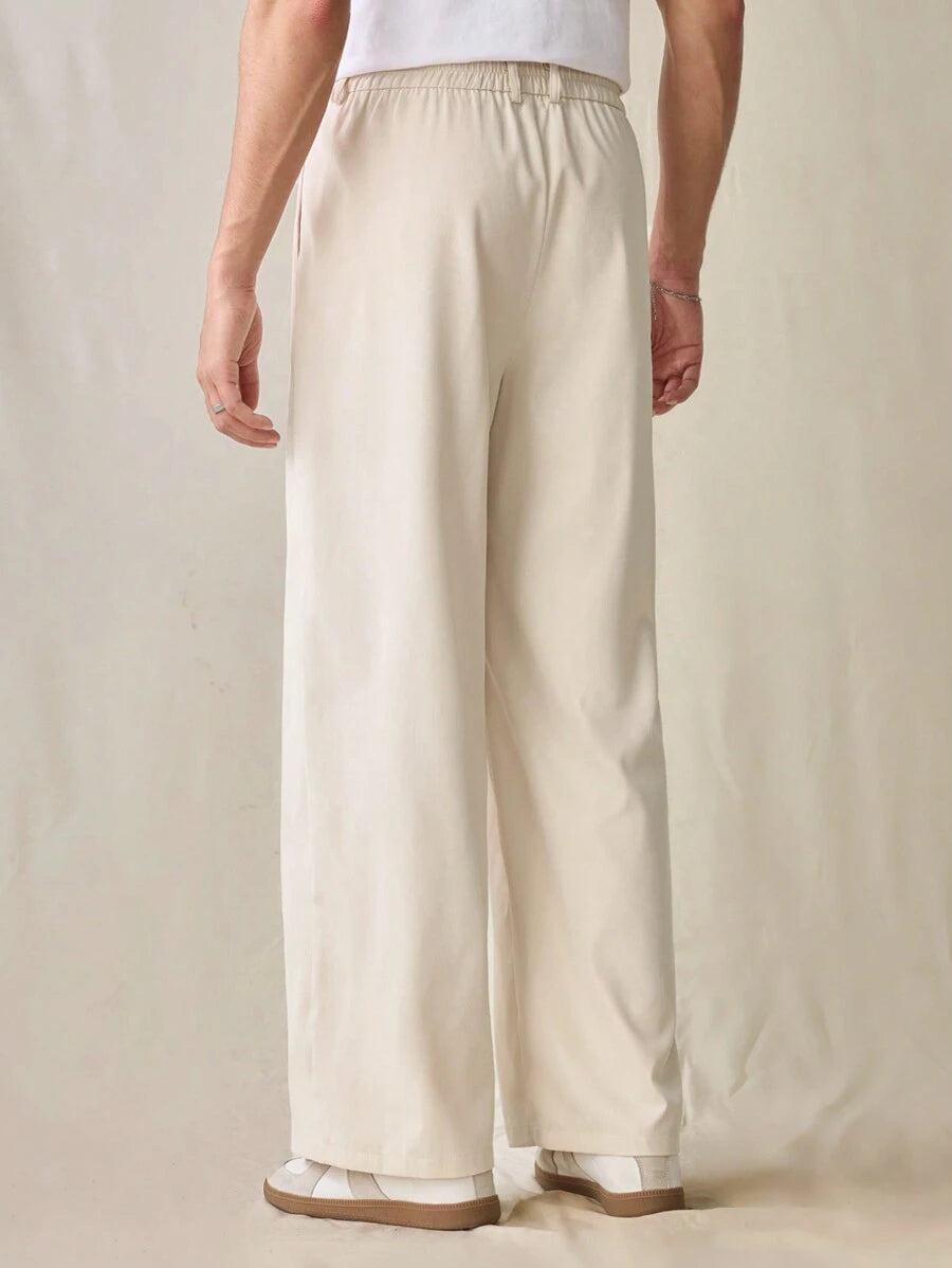 Pantalon droit décontracté à taille élastique et coupe ample pour homme