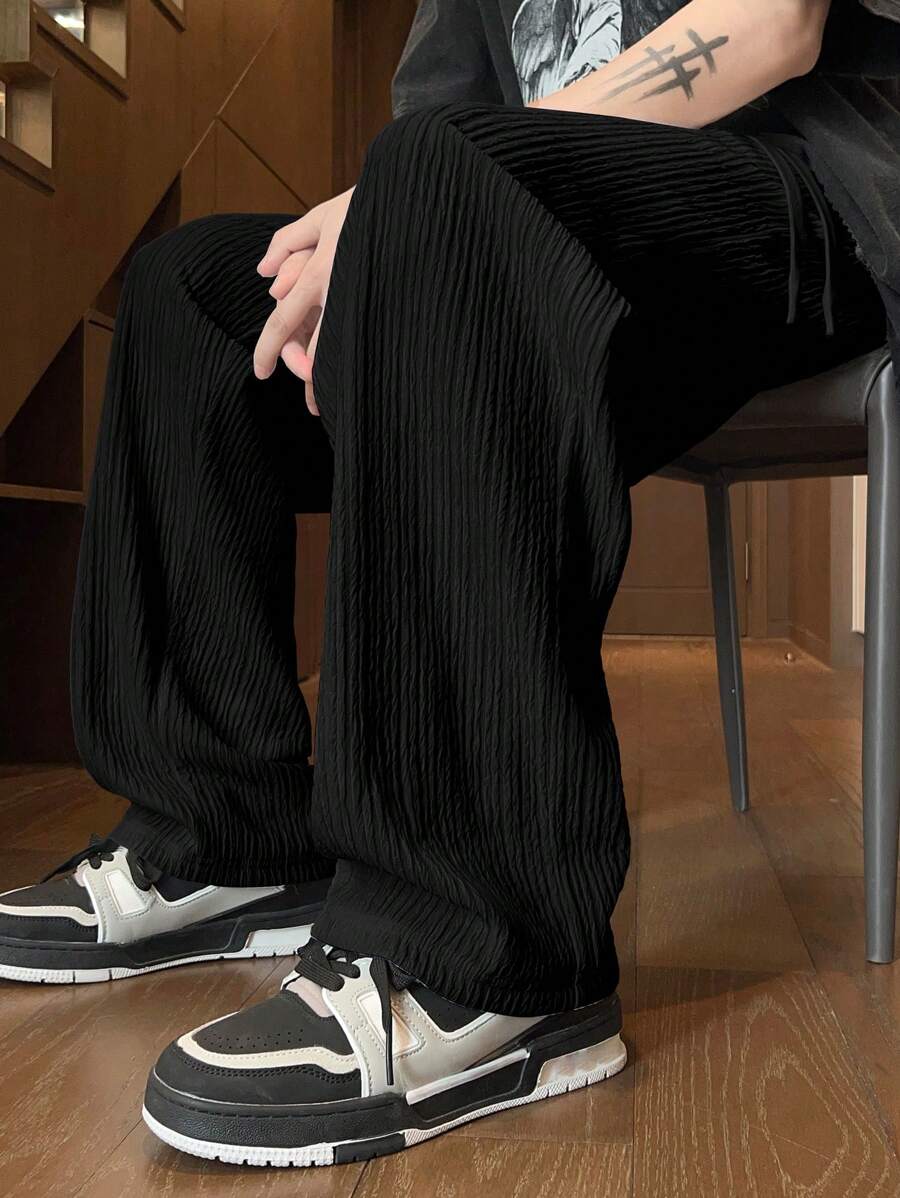 Pantalon droit décontracté en tissu froissé de couleur unie pour homme