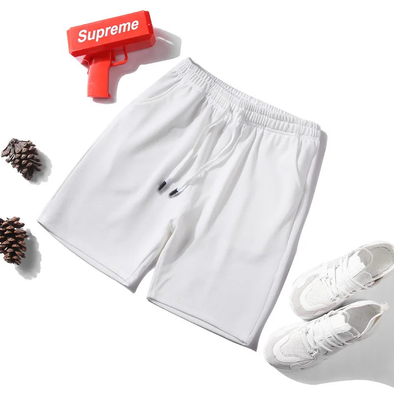 Short de sport à taille élastique et séchage rapide avec maille pour homme