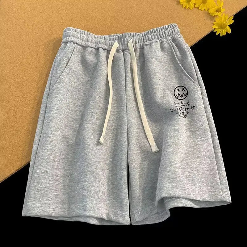 Short décontracté surdimensionné à taille élastique et cordon de serrage pour homme