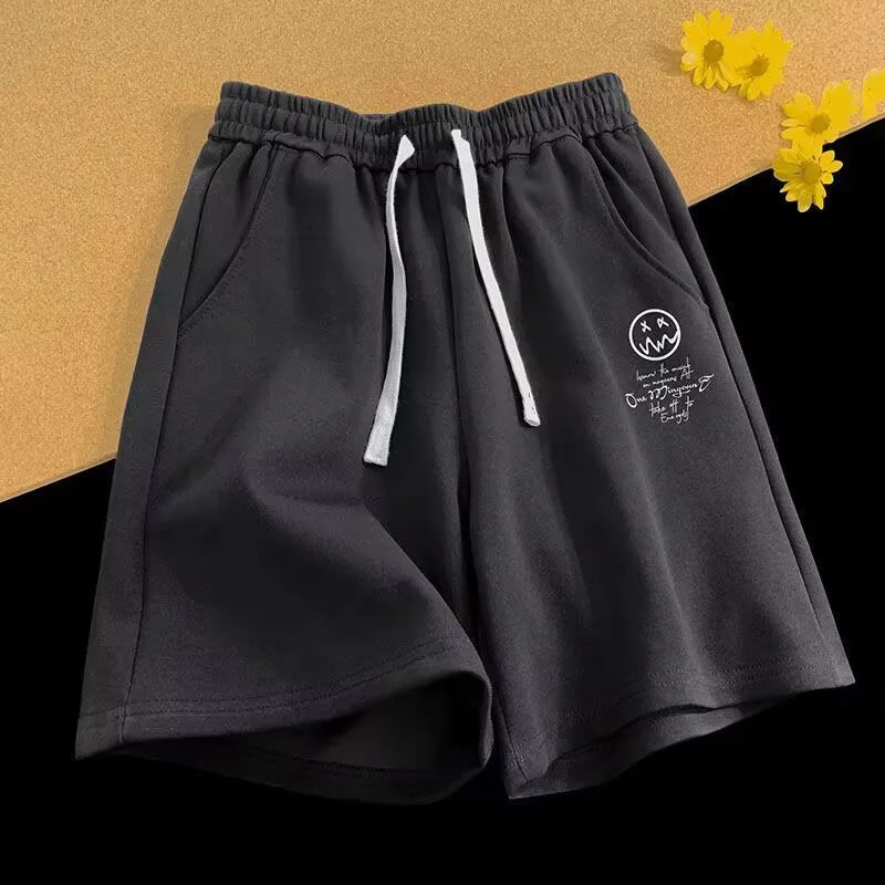 Short décontracté surdimensionné à taille élastique et cordon de serrage pour homme