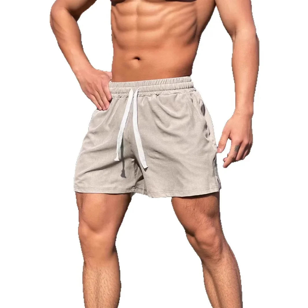 Shorts de sport larges avec taille élastique et cordon tendance