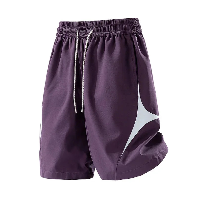 Short de sport décontracté à séchage rapide et coupe ample avec motif color block