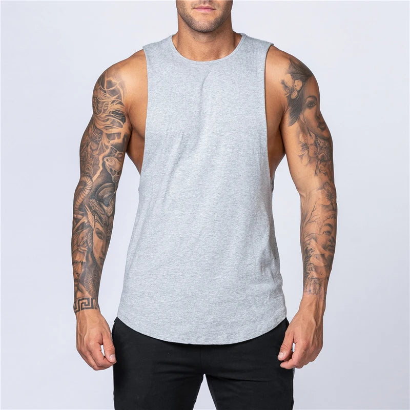 Chemises de sport en coton sans manches à emmanchures larges pour homme