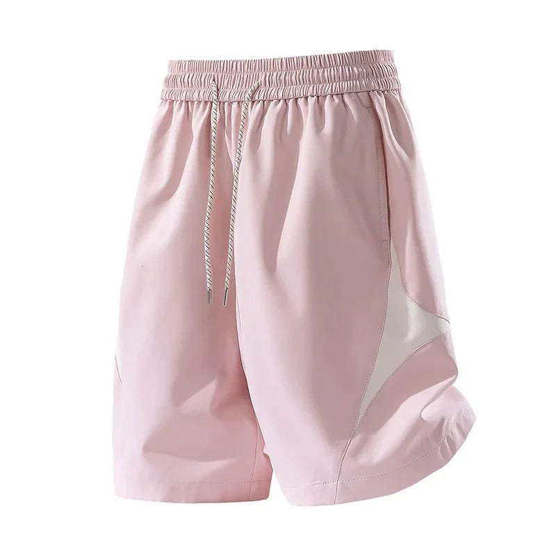 Short de sport décontracté à séchage rapide et coupe ample avec motif color block