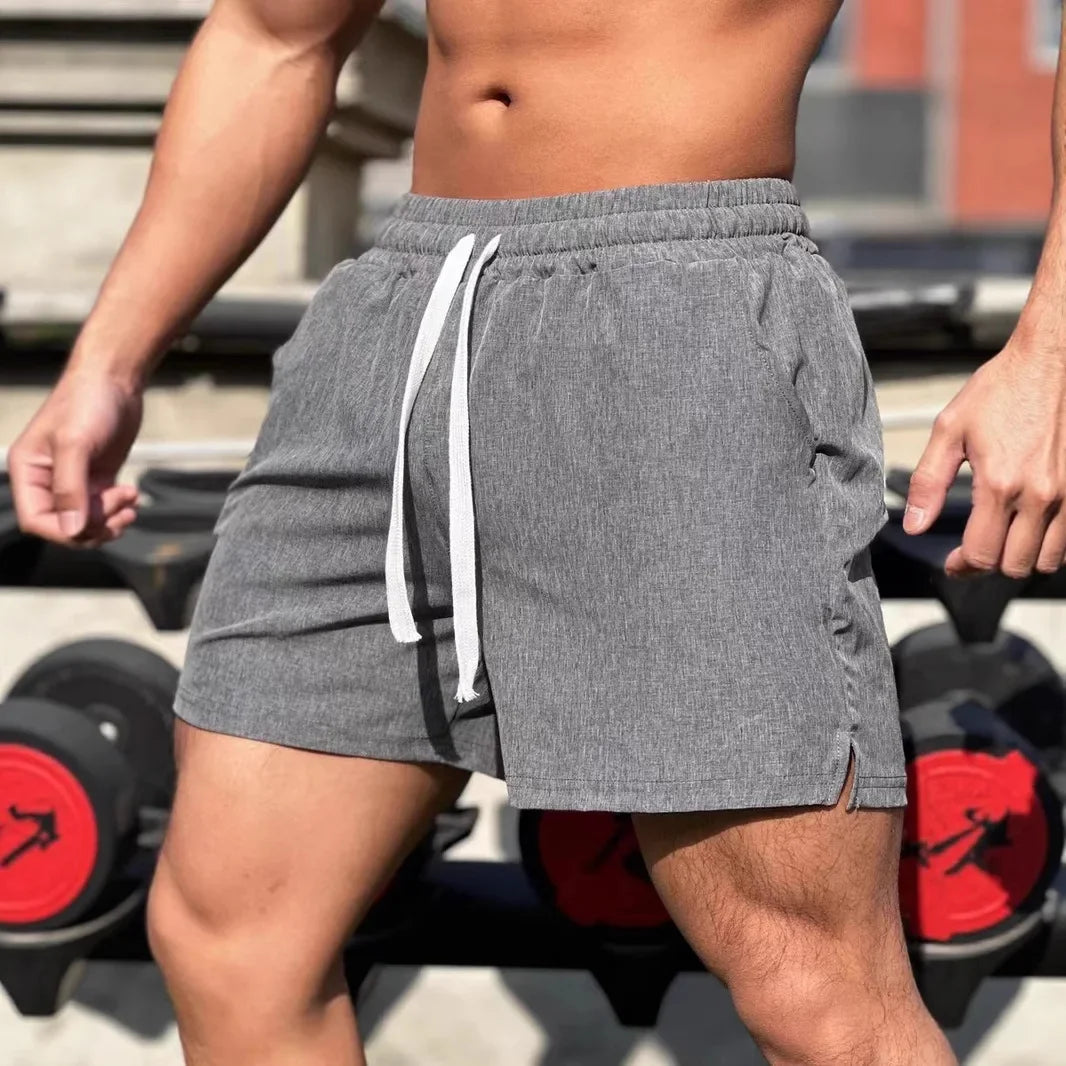 Shorts de sport larges avec taille élastique et cordon tendance