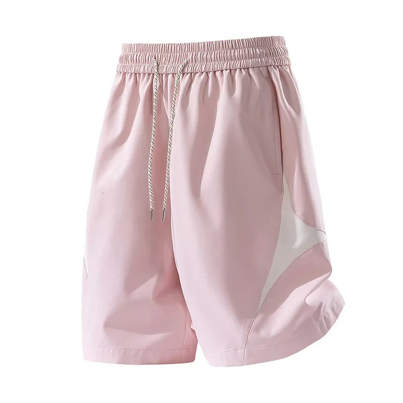 Short de sport décontracté à séchage rapide et coupe ample avec motif color block