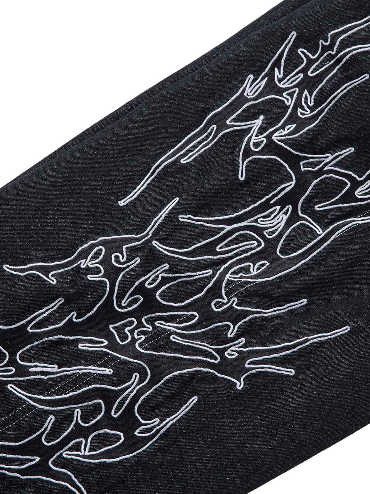 Pantalon ample à jambes larges et brodé de flammes pour homme